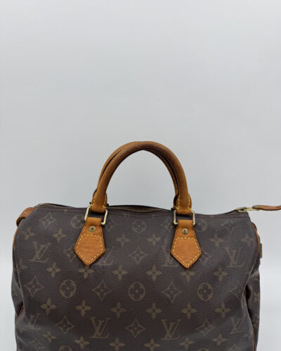 Louis Vuitton Speedy 30 in bruin Monogram canvas met Vachetta leren handvatten